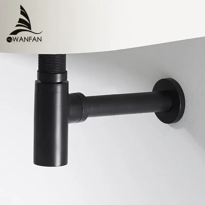 Modern matte black round bottle trap with pop up drain made of sleek matte-finish metal for under-sink use
