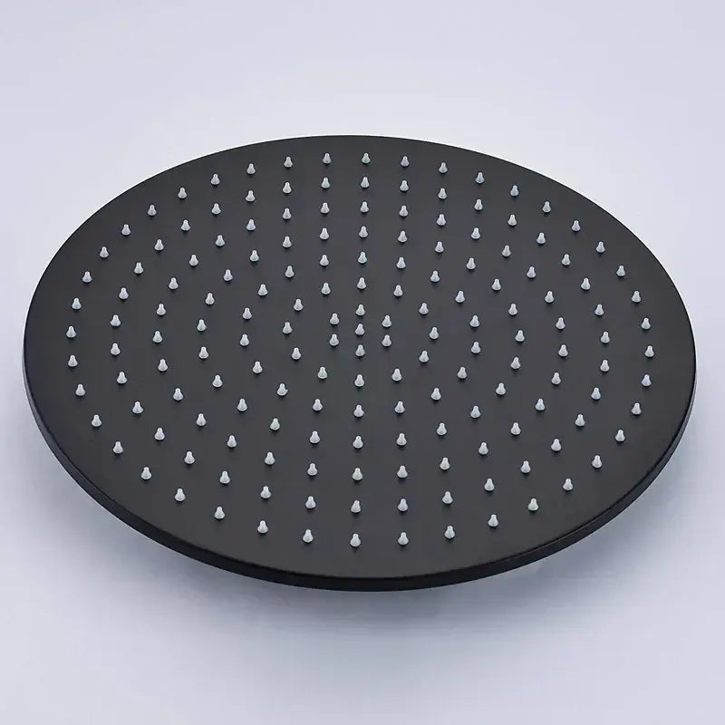 Modern matte black round brass rain shower head with black matte finish and evenly spaced silver-toned nozzles
