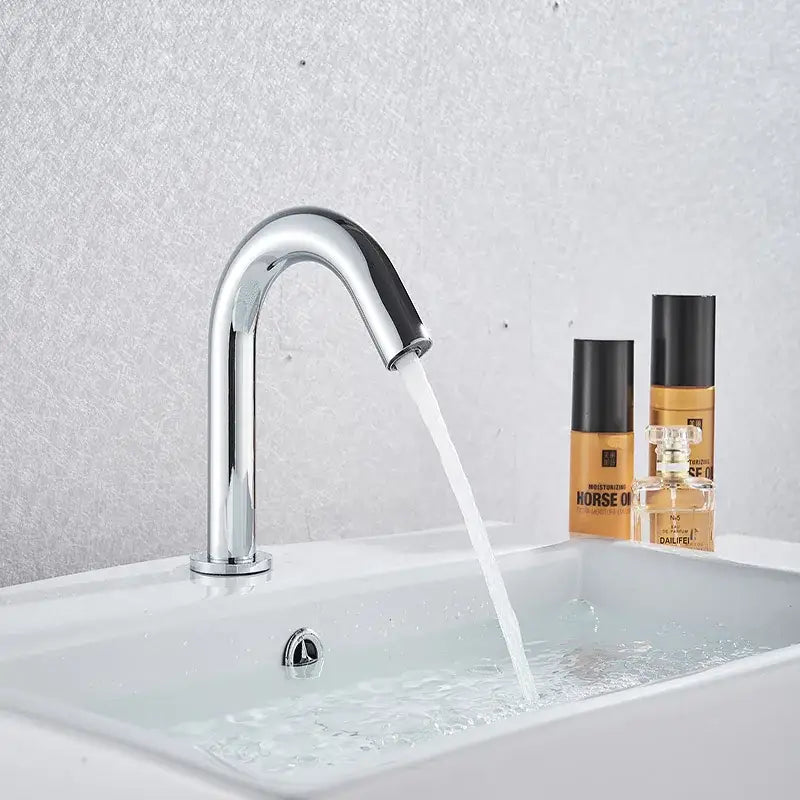 Modern matte black sensor faucet with chrome single-handle and sleek curved spout featuring black sensor faucet accents
