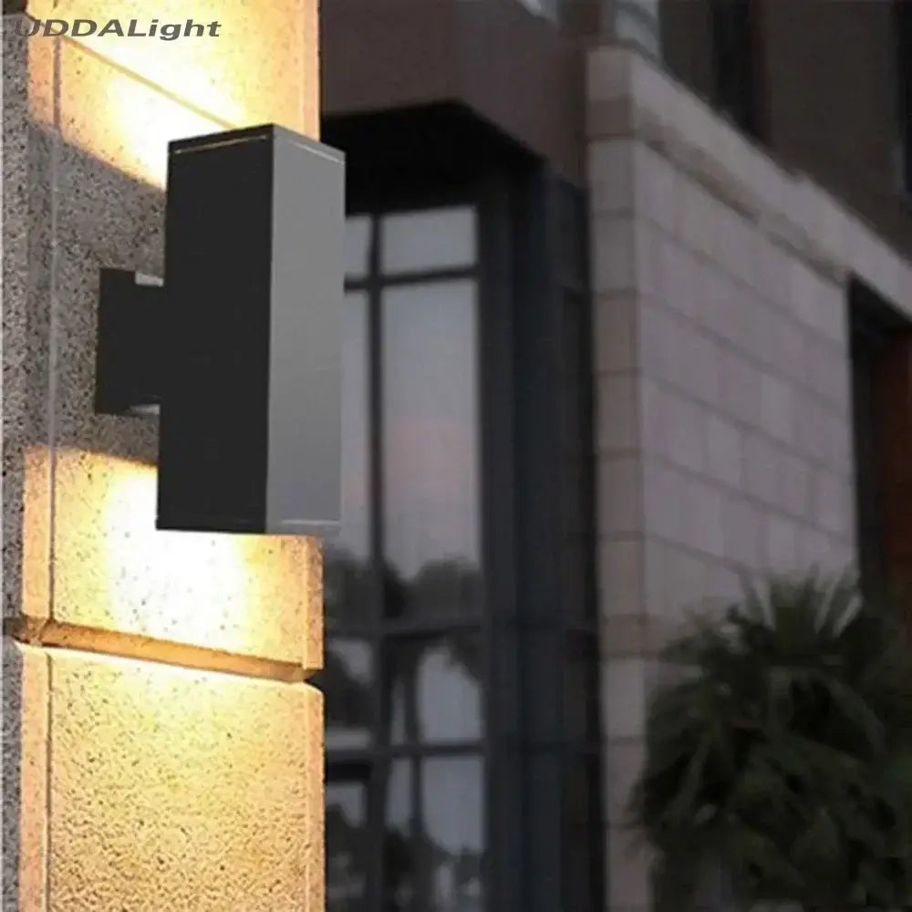 Modern matte black and silver outdoor wall lamp with sleek minimalist design as a garden outdoor wall lamp