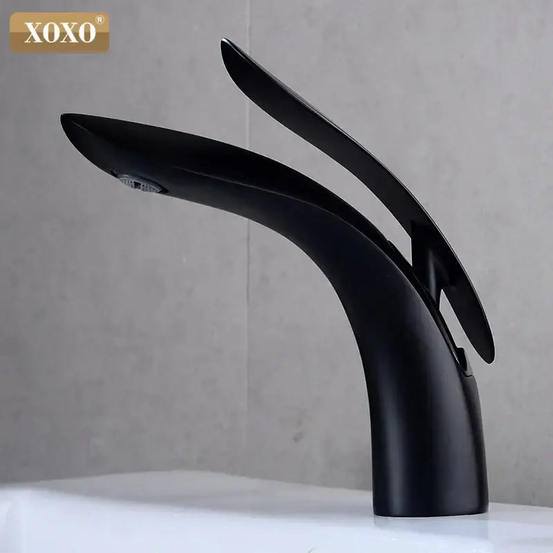Modern matte black single handle basin faucet with black matte finish and dual spout arches by xoxo brand decorbites gold single