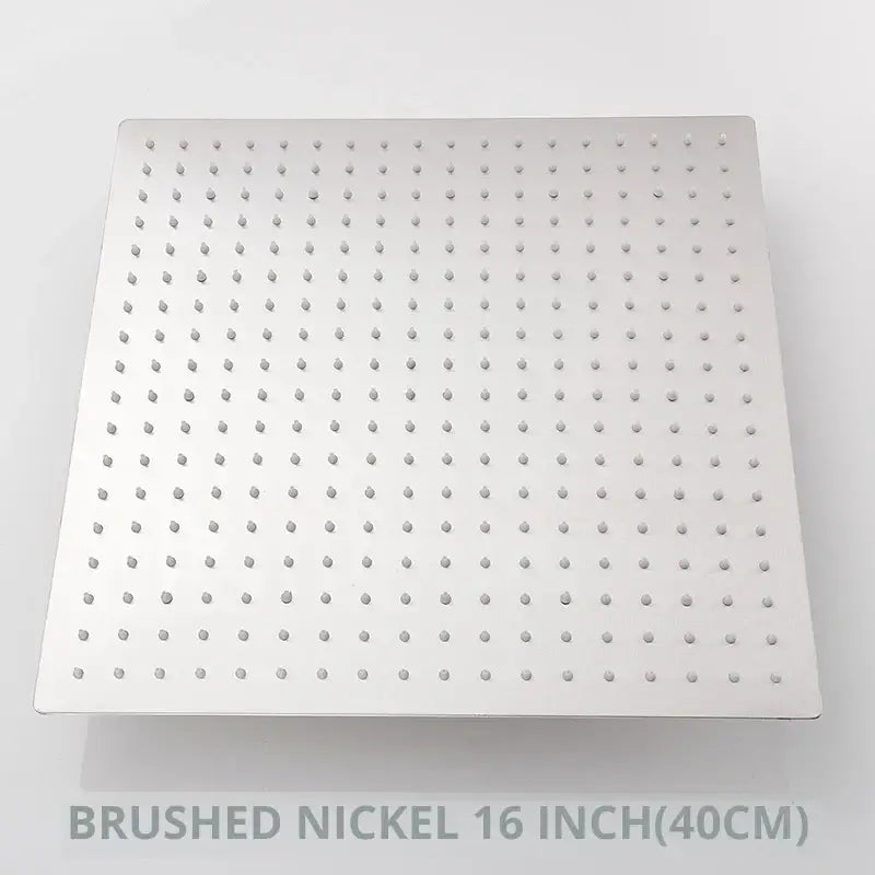 Brushed nickel square rainfall shower head with grid of spray nozzles in modern matte black shower head design