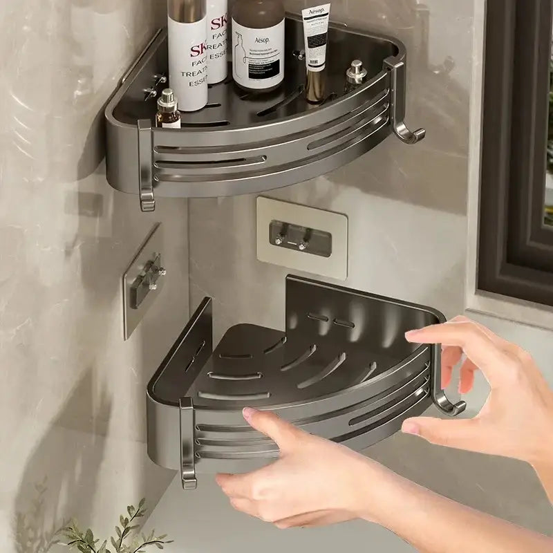 Silver-toned double-tiered stainless steel corner shelf organizer with integrated hooks for modern bathroom storage