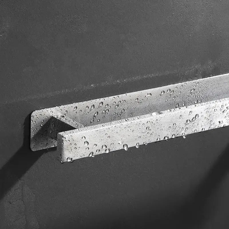 Silver metallic u-shaped towel rack with sleek modern design and water droplets for decorbites black steel towel hanger