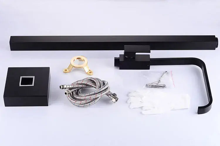 Modern matte black tall basin faucet with black matte finish brass accents and flexible braided hose for bathroom sinks