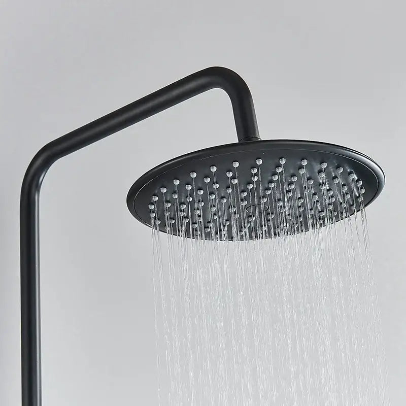 Modern matte black thermostatic shower faucet set with round black matte showerhead and multiple water jets streaming downward