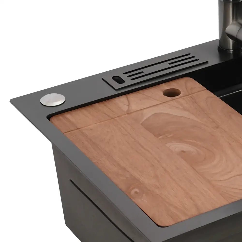 Modern matte black utility sink with integrated kitchen accessories - Decorbites