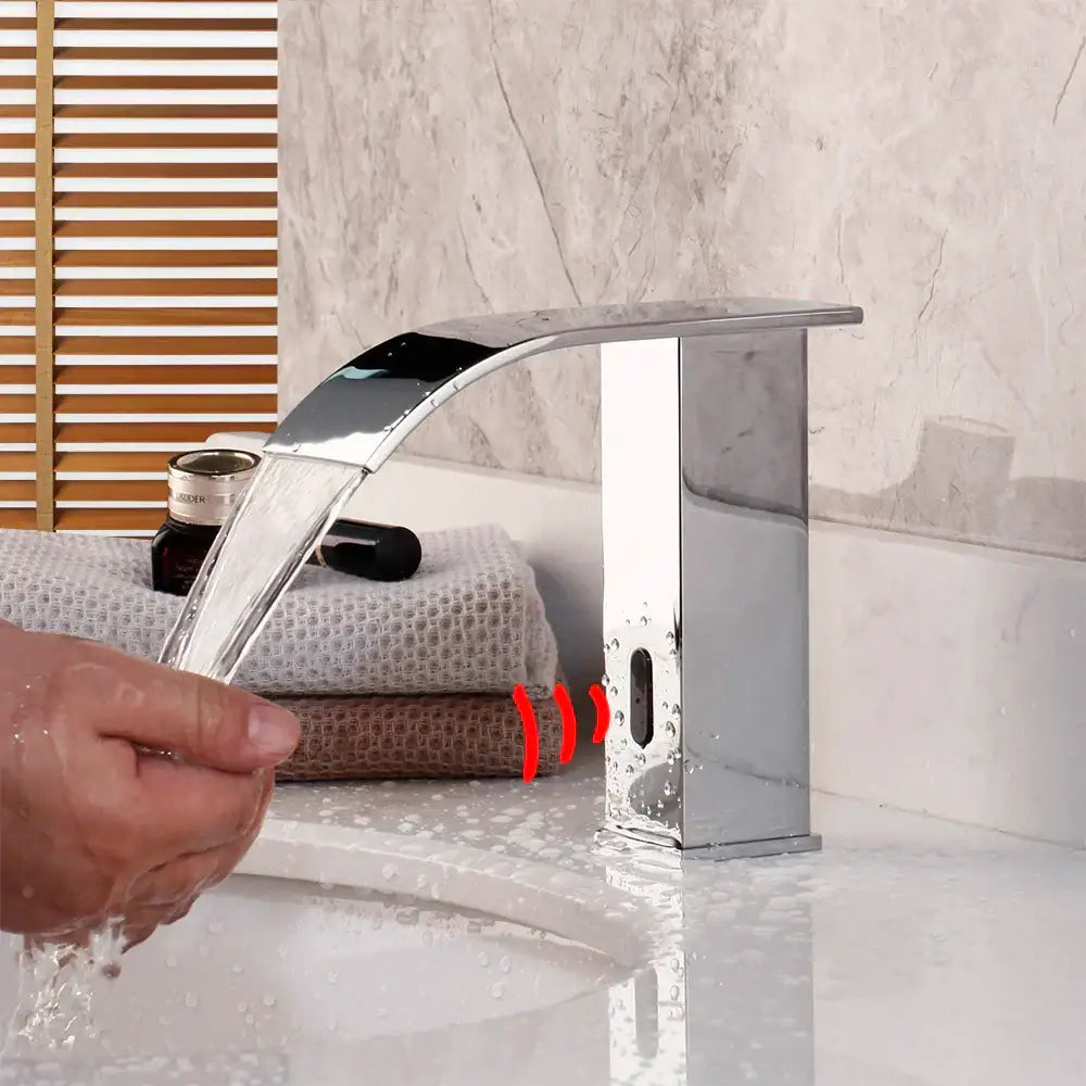 Modern chrome-finished waterfall automatic sensor water mixer faucet with sleek rectangular base and curved spout
