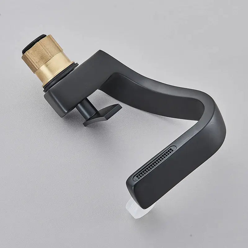 Modern matte black waterfall basin faucet with brass threaded connection and integrated spray nozzle for black waterfall bathroom