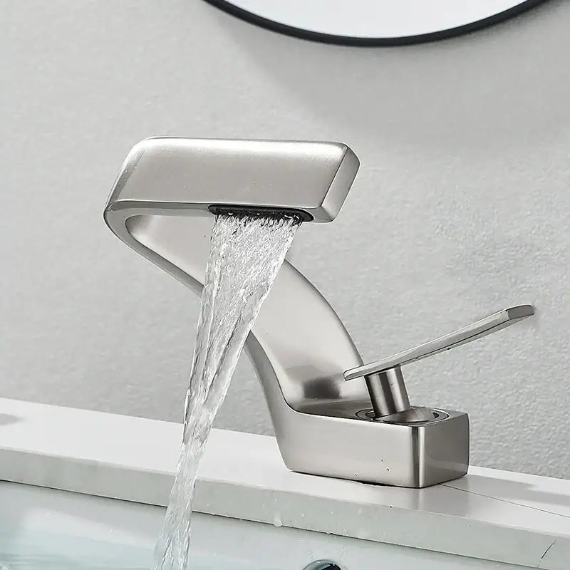 Modern brushed stainless steel basin faucet with sleek angular design for decorbites black waterfall bathroom use