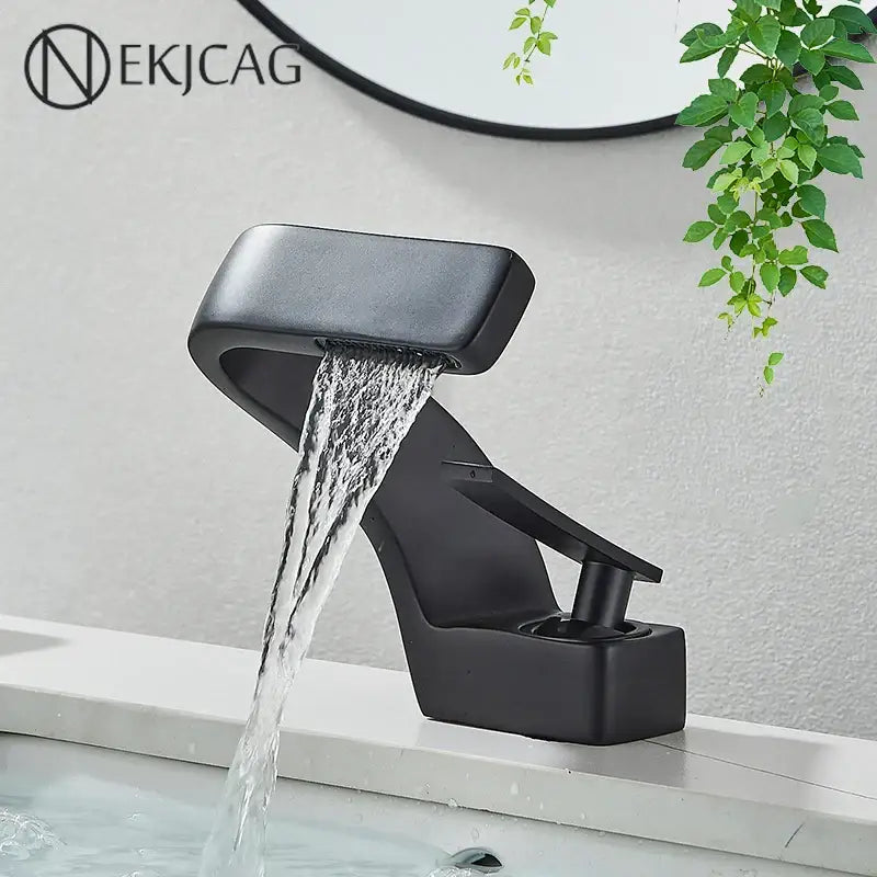 Modern matte black waterfall basin faucet with angular design in black waterfall bathroom decorbites style