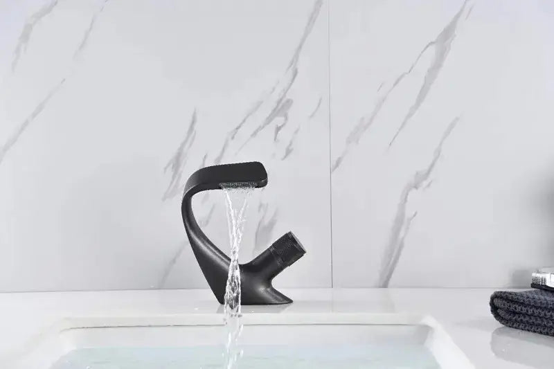Modern matte black waterfall basin faucet with sleek curved design for bathroom sink decorbites gray basin faucet