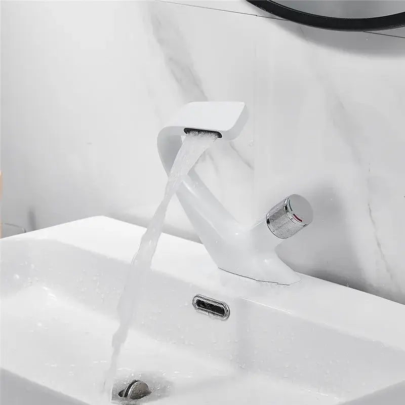 Modern white ceramic basin faucet with sleek curved design and chrome finish handle for decorbites gray basin use