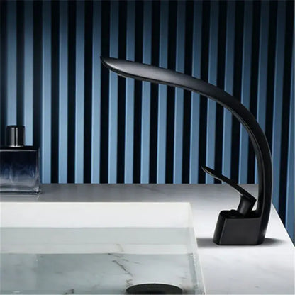 Modern matte black waterfall basin faucet single handle mixer with sleek curved design and integrated led lighting