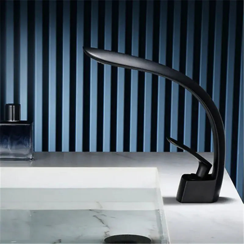Modern matte black waterfall basin faucet single handle mixer with sleek curved design and integrated led lighting