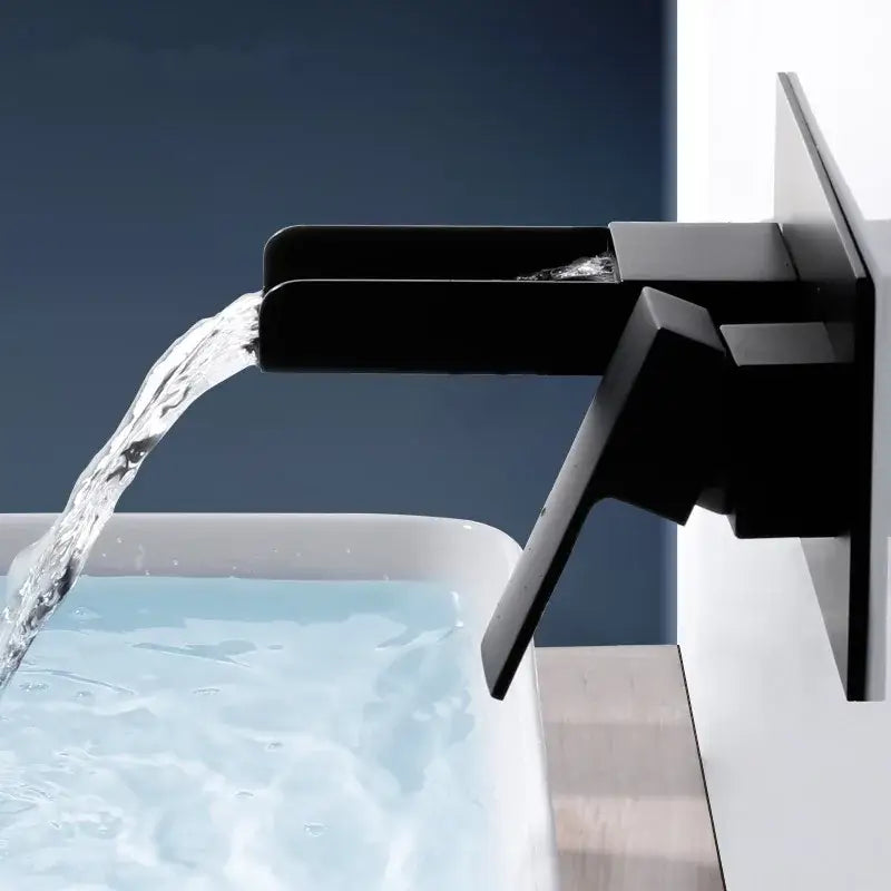 Modern matte black waterfall basin mixer tap with angular design wall mounted for bathroom use