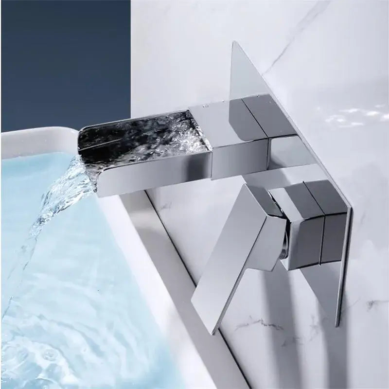 Modern chrome finished basin mixer tap with angular geometric design for bathroom wall mounted waterfall basin mixer