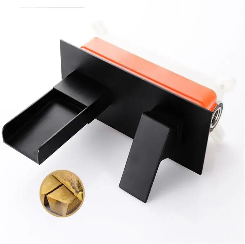 Modern matte black waterfall basin mixer tap with orange plastic handle and brass hexagonal bolt head for bathroom wall mounting