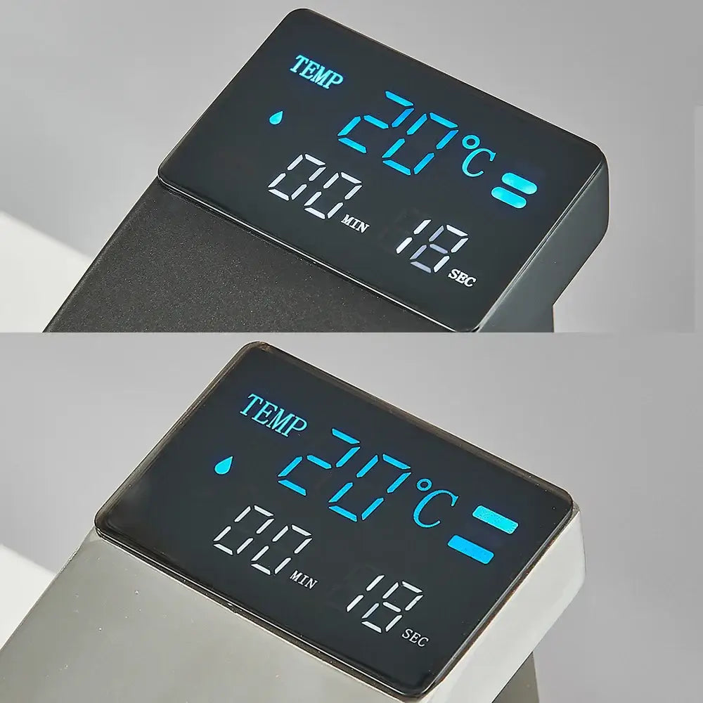 Black digital thermometer with blue illuminated temperature display paired with modern matte black bathroom faucet decorbites brass waterfall