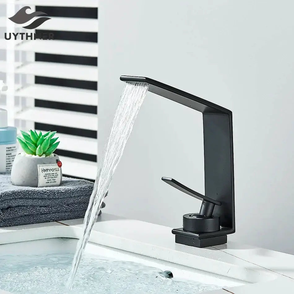 Modern matte black waterfall decorbites basin faucet with sleek design and matte finish for bathroom use