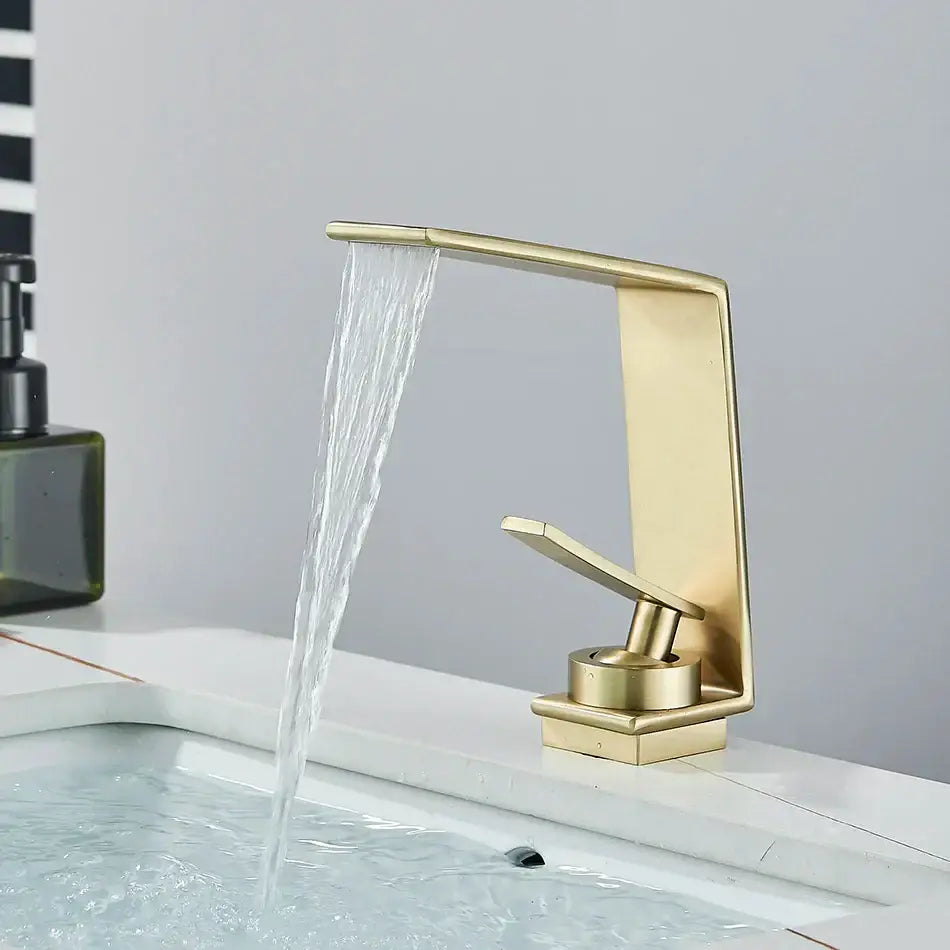 Modern matte black decorbites basin faucet with gold-toned waterfall design and brushed metal finish for bathroom use