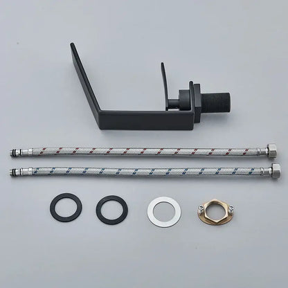 Modern matte black waterfall decorbites basin faucet with a minimalist design and integrated handle for bathroom use