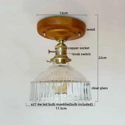 Modern matte dome ceiling lamp with led wood canopy featuring warm wood base brass copper socket and clear ridged glass shade