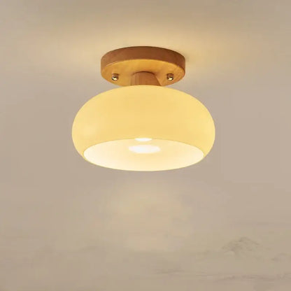 Modern matte dome ceiling lamp with warm-toned frosted glass and a led wood canopy for living room decorbites led wood