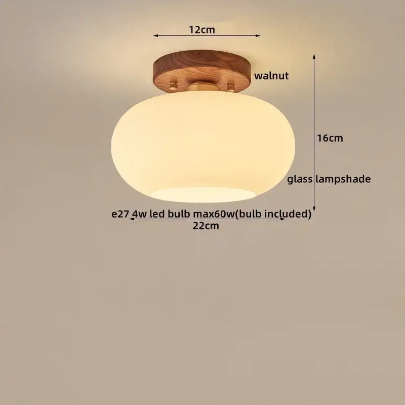 Modern matte dome ceiling lamp with warm-toned glass lampshade and walnut finish decorbites led wood canopy