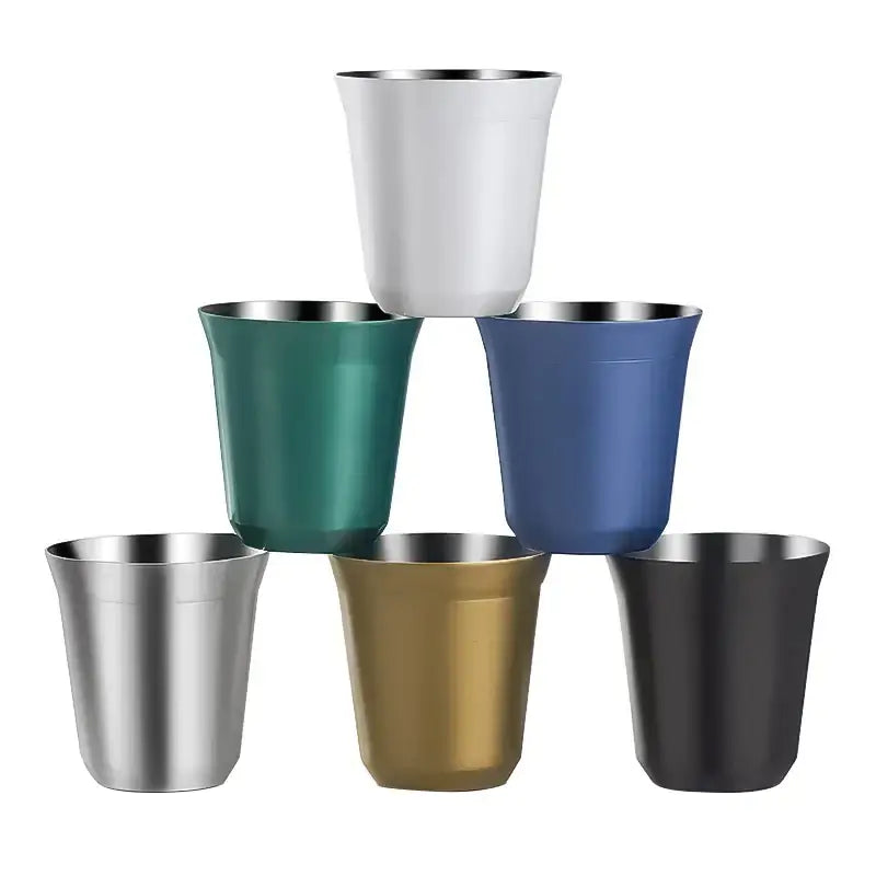 Set of six sleek modern stainless steel double walled espresso cups in assorted matte finishes including white teal blue silver gold and black