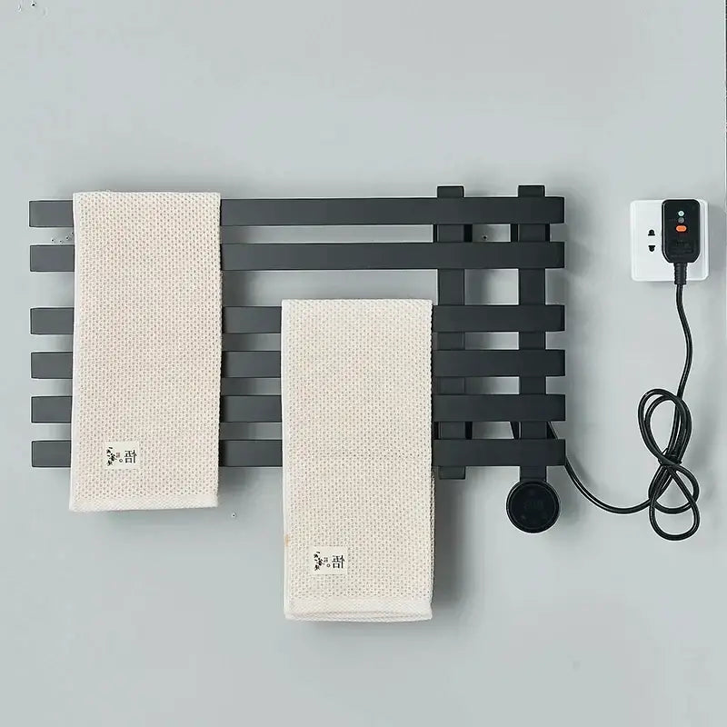 Modern matte gray black metal towel warmer with two off-white textured towels for digital touch bathroom decorbites use