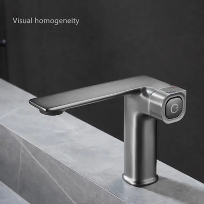 Modern matte gray sink mixer with brushed stainless steel, single-handle design and touch-sensitive control button