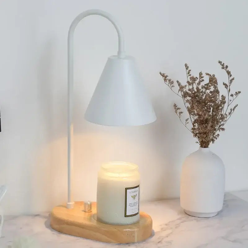 White curved-arm electric candle lamp with conical shade and wooden base candle lamp warmer for bedroom use