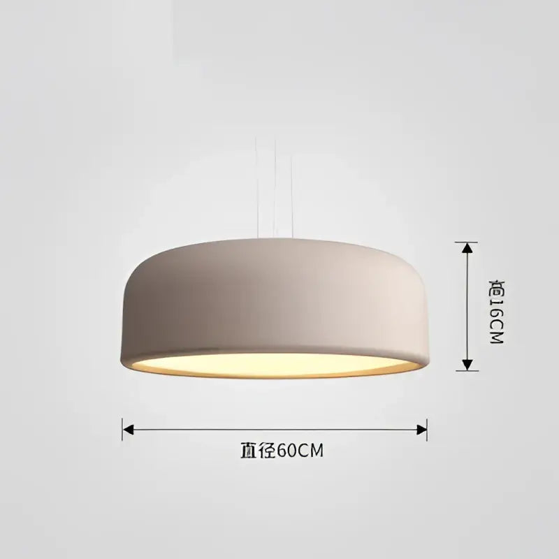 Modern matte green macaron ceiling chandelier with a beige cylindrical shade and warm yellow glow for living room decorbites colorful macaron
