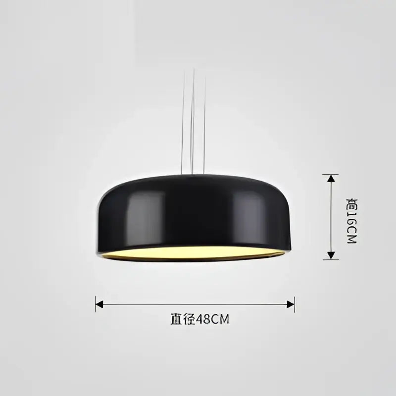 Modern matte green macaron ceiling chandelier with black matte dome pendant light and warm yellow interior glow decorbites colorful macaron