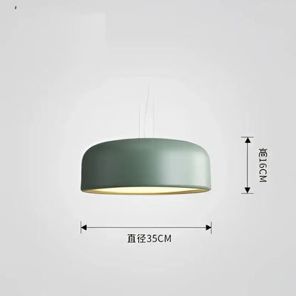 A sleek matte sage green macaron ceiling chandelier with modern dome design and warm interior glow for decorbites colorful macaron decor