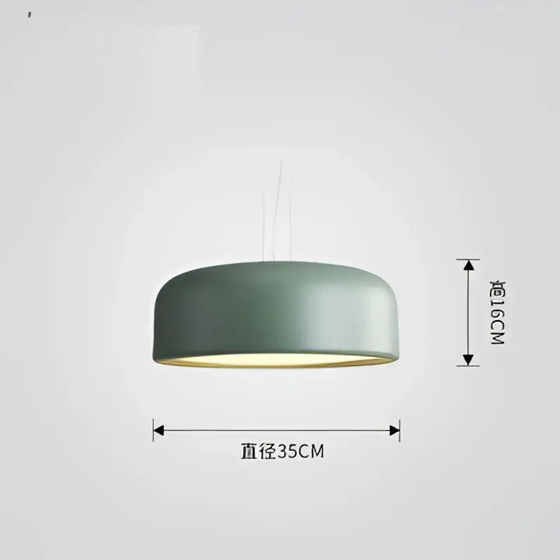 A sleek matte sage green macaron ceiling chandelier with modern dome design and warm interior glow for decorbites colorful macaron decor