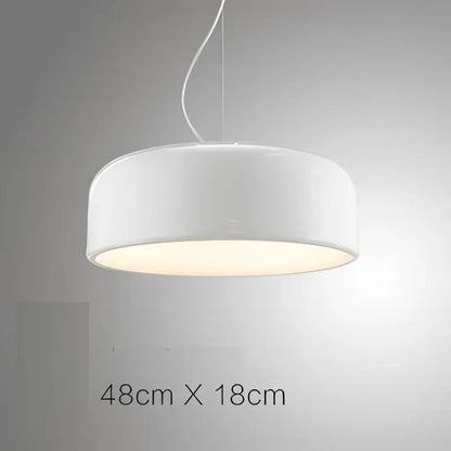 Modern matte green macaron ceiling chandelier with white cylindrical pendant light featuring smooth matte finish and warm glow