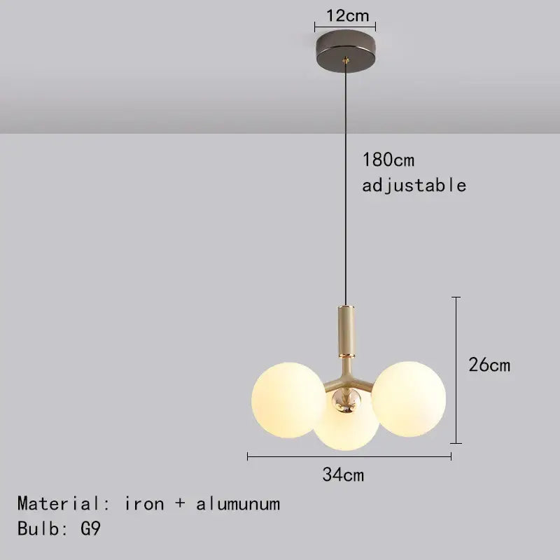 Modern matte red decorbites glass ball pendant lighting fixture with brass-finished iron frame and frosted glass globes for living room