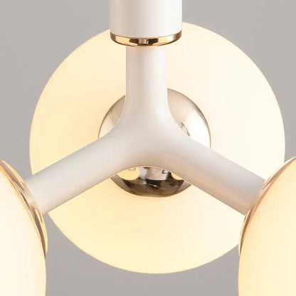 Modern white and gold three-arm pendant light with frosted glass globe shades decorbites glass ball pendant lighting fixture