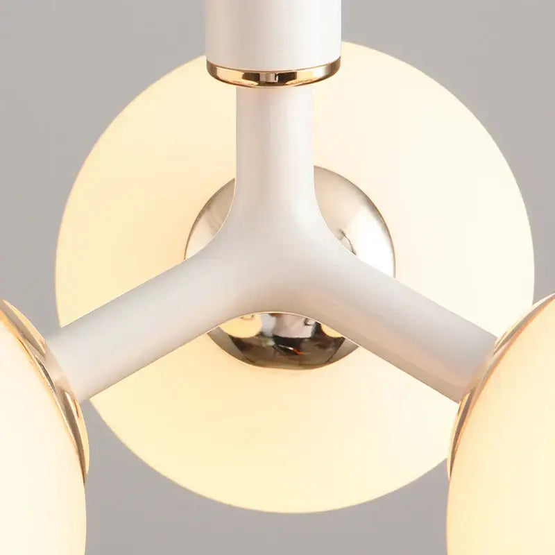 Modern white and gold three-arm pendant light with frosted glass globe shades decorbites glass ball pendant lighting fixture
