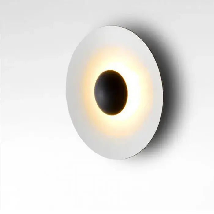 Modern matte white and brushed bronze ginger round wall lamp with sleek circular design and warm ambient light decorbites ginger round wall
