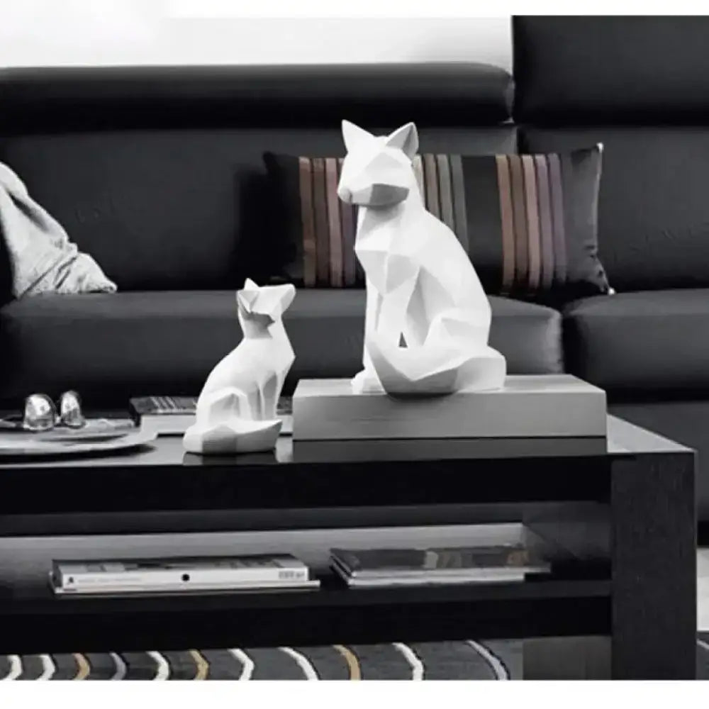 Modern matte white geometric fox sculpture with angular faceted design ideal for living room decorbites geometric fox decor