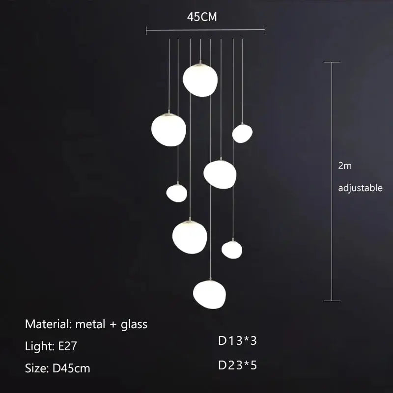Modern matte white glass orb pendant light fixture with adjustable metal suspension for dining room decorbites gregg glass pendant