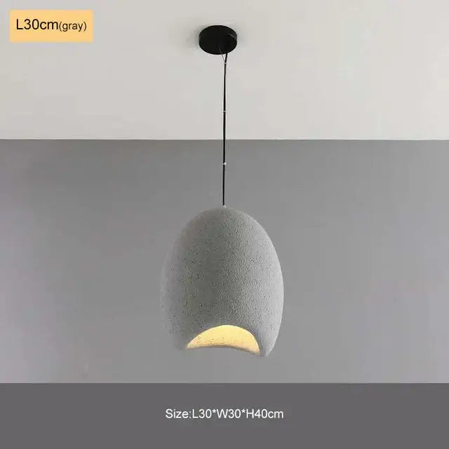 Modern matte white industrial wind chandelier bedroom pendant light with a gray textured egg-shaped pendant emitting warm glow