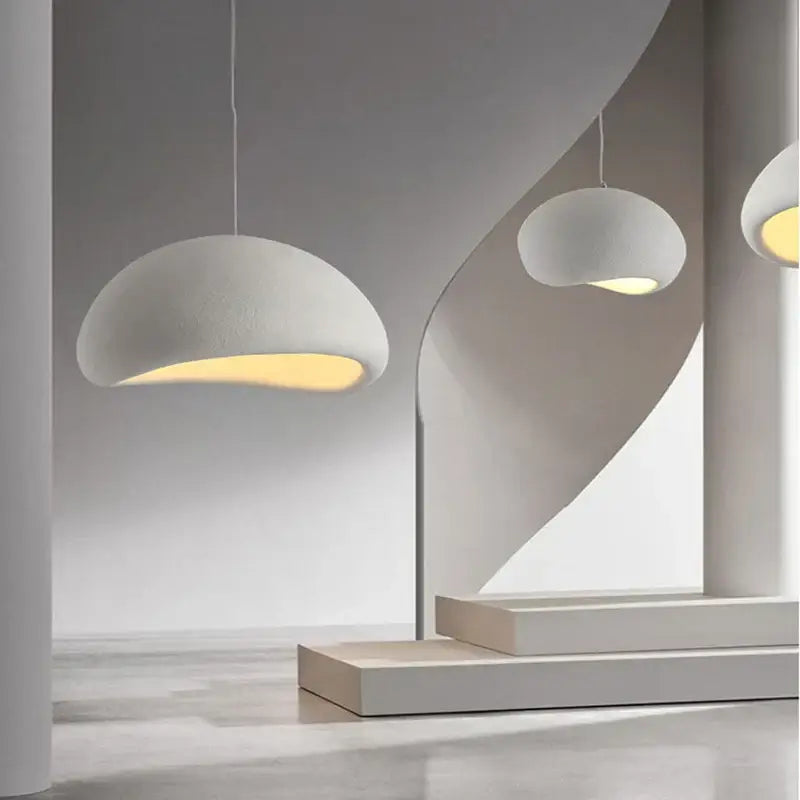 Modern matte white industrial wind chandelier with textured dome pendant lights and warm yellow interiors for bedroom decorbites light industrial