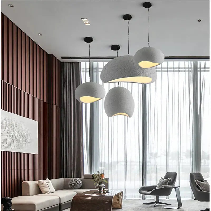Modern gray concrete pendant lights with matte texture and warm glow for decorbites light industrial bedroom use