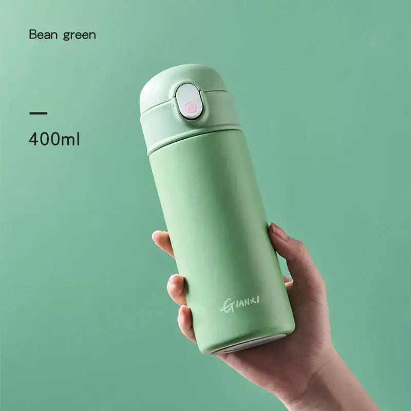 A sleek 400ml bean green decorbites insulated stainless steel thermos bottle with soft-touch lid and subtle logo