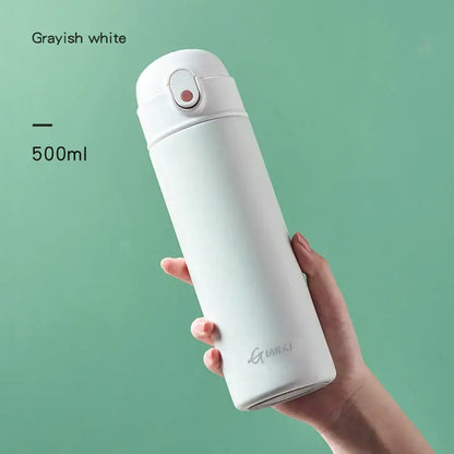 Grayish white 500ml decorbites insulated stainless steel thermos bottle with sleek minimalist design and subtle logo