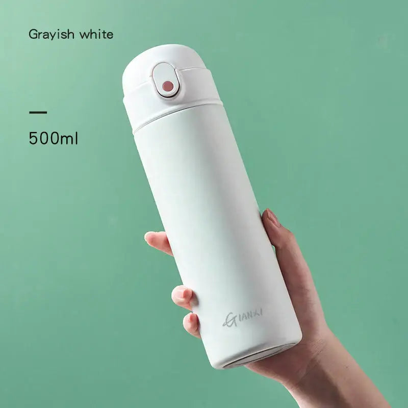 Grayish white 500ml decorbites insulated stainless steel thermos bottle with sleek minimalist design and subtle logo